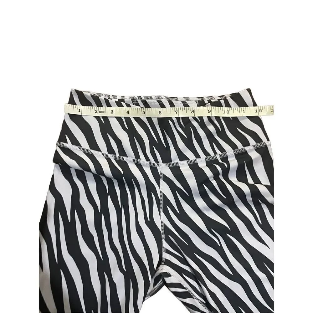 The Nike One Tight Fit Mid Rise zebra animal‎ print leggings 7/8 length S